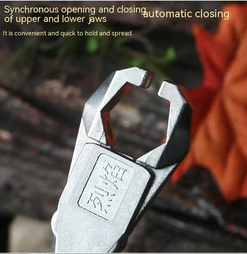 Alloy archery release aid showing two-axis harpoon clip mechanism for bowstring engagement