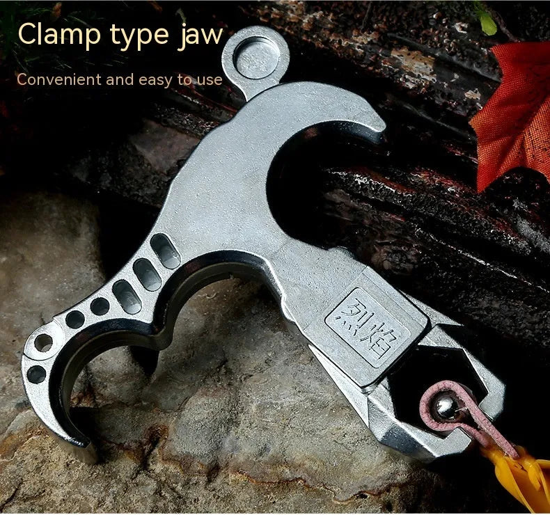 Alloy archery release aid showing two-axis harpoon clip mechanism for bowstring engagement