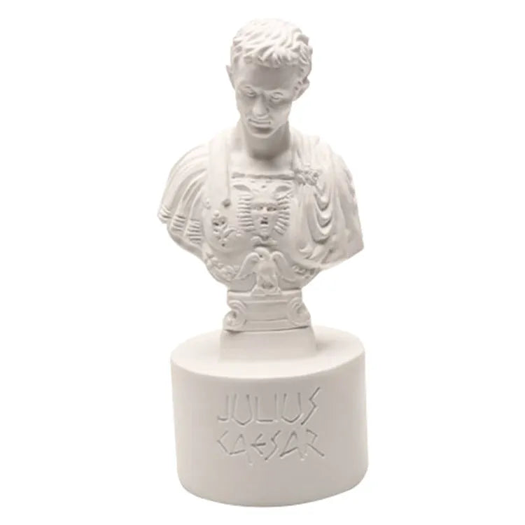 White synthetic resin pen holder with American creative character modelling design on a desk.