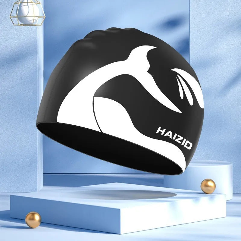 Silicone swim cap with whale tail pattern and waterproof ear protectors in multiple colours