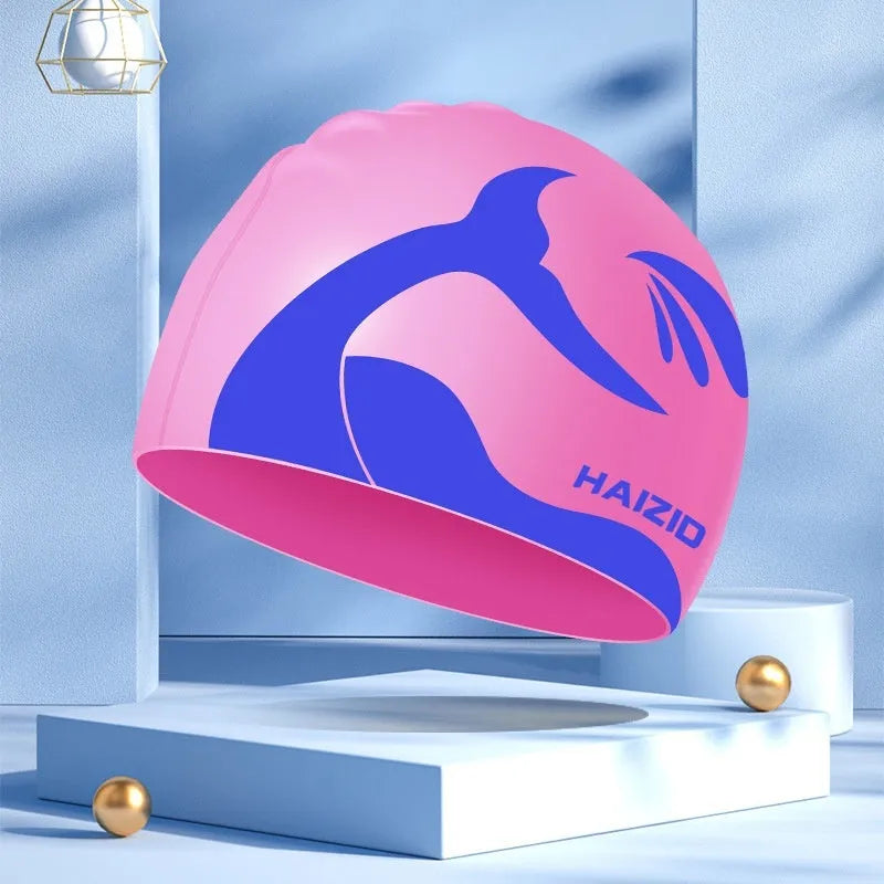 Silicone swim cap with whale tail pattern and waterproof ear protectors in multiple colours
