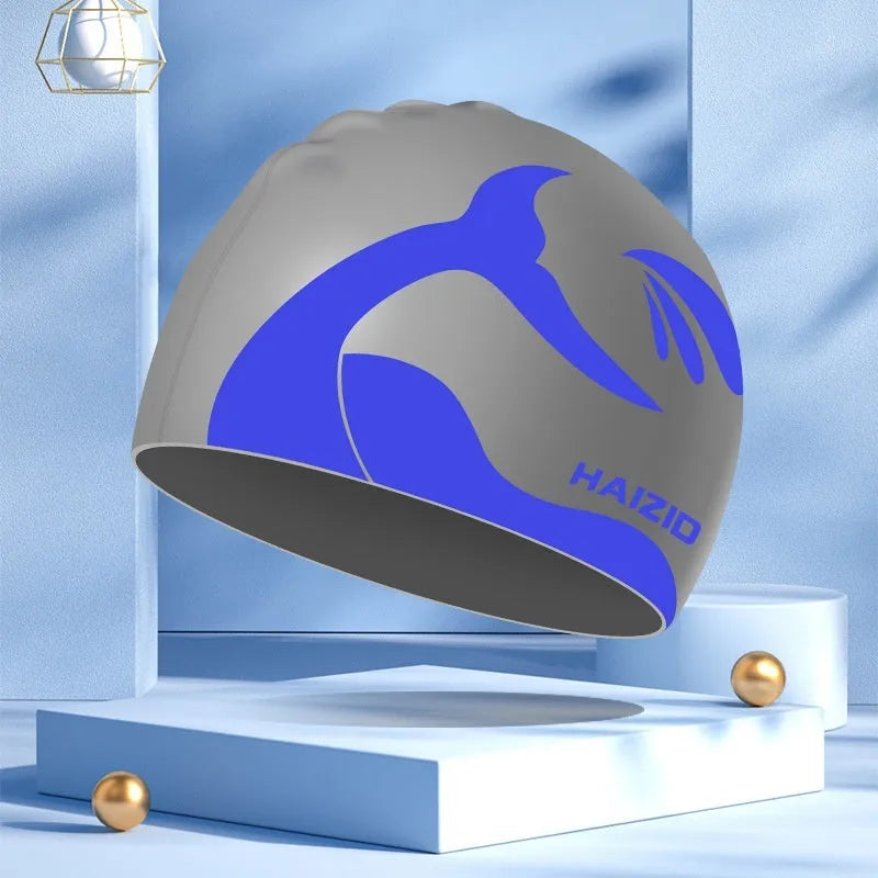 Silicone swim cap with whale tail pattern and waterproof ear protectors in multiple colours