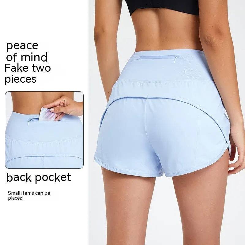 Women's high-waisted black nylon fitness shorts for running and gym workouts