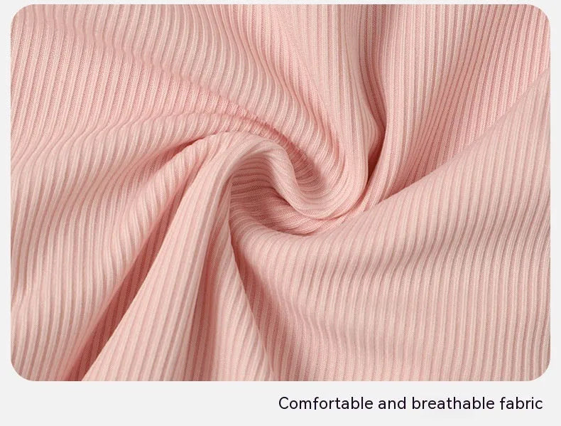Pink women's conservative one-piece nylon swimsuit on a hanger.