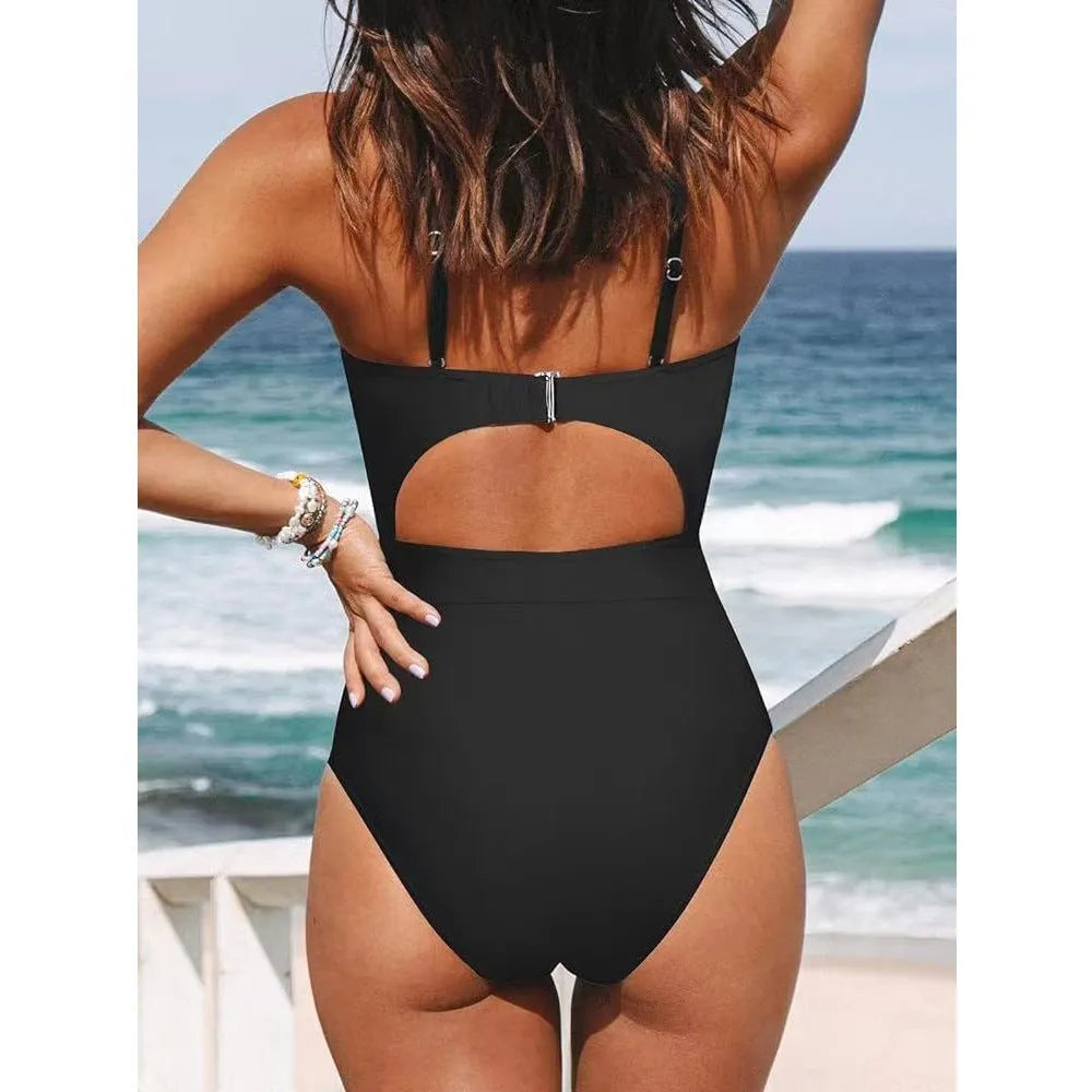 Women's solid color one-piece swimsuit with cross back design in black, wine red, or peacock blue