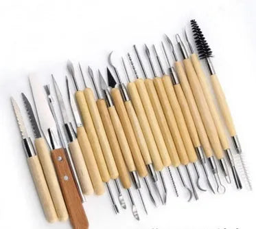 Brown 27-piece pottery tool set with stainless steel, wood, and plastic tools and a rolling tool, packed in an OPP bag.