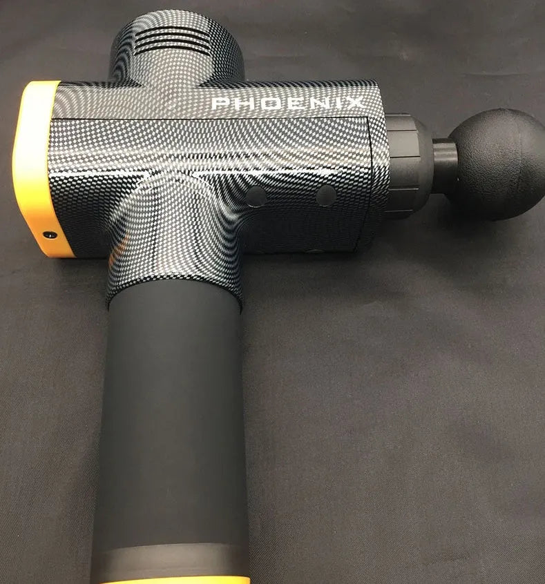 Black deep tissue fascia massage gun with four removable heads on a grey background
