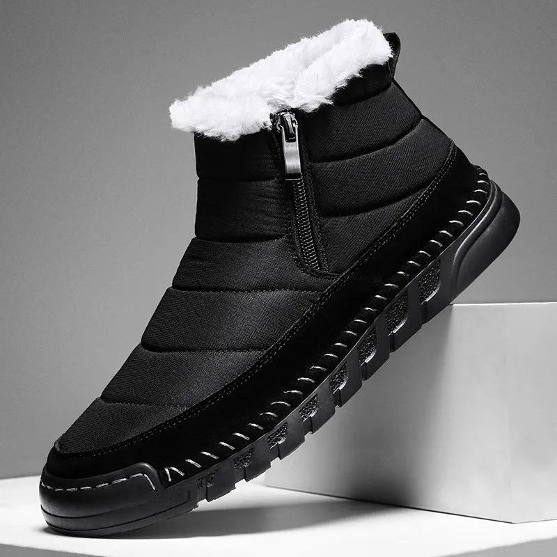 Men's plus size snow boot in a solid colour with a round toe, flat heel, and non-slip rubber sole.