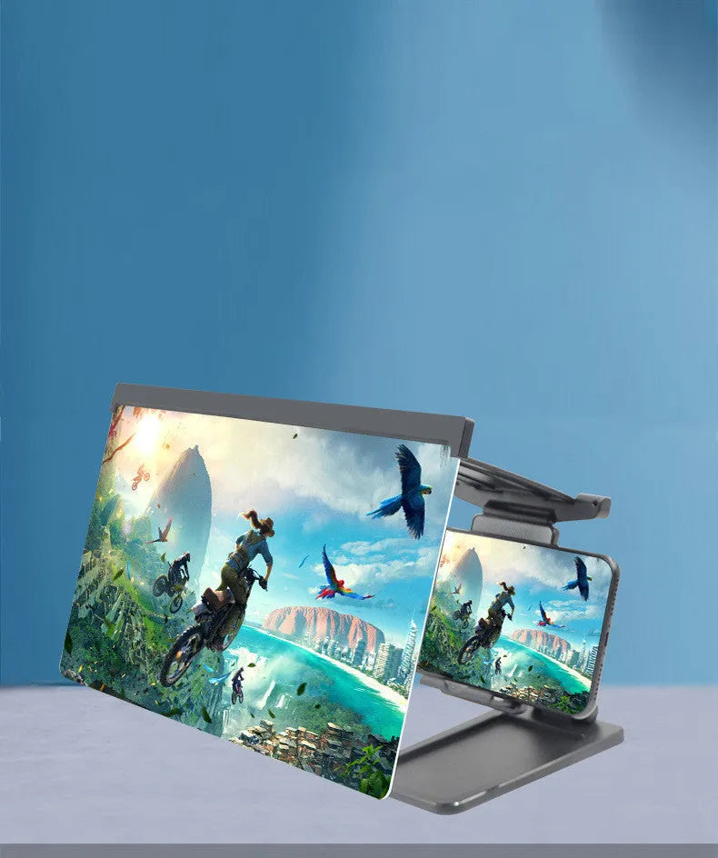 Black folding mobile phone screen amplifier with detachable holder, shown magnifying a smartphone display.