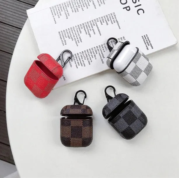 Plastic hard shell iPhone XS MAX case with a grid pattern and an integrated anti-lost hook for Bluetooth headsets.