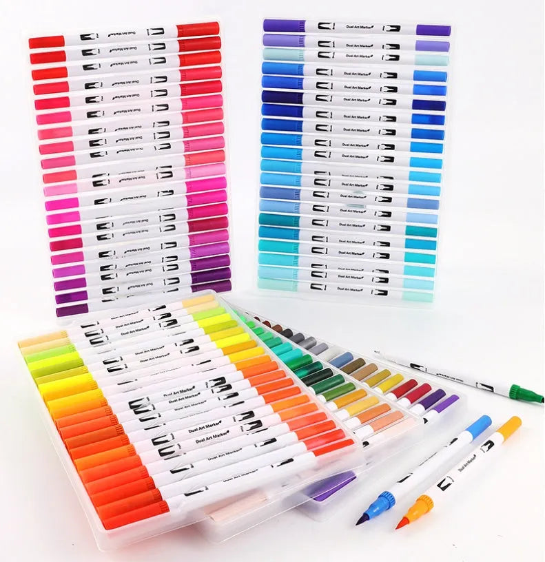 Watercolour pen set showing multiple colours creating ink wash effects on paper