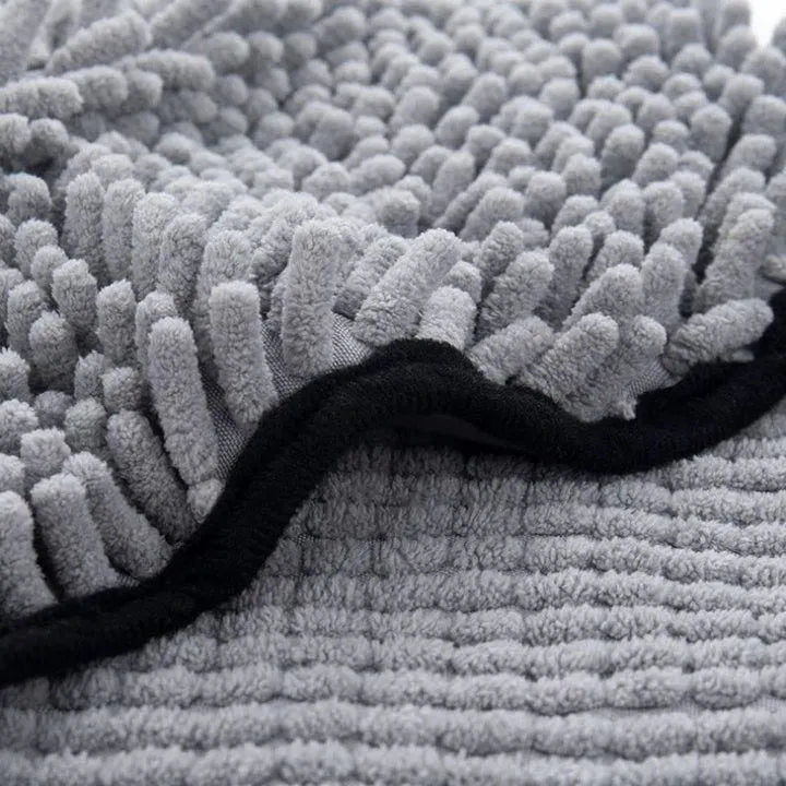 Blue dog bath robe towel measuring 62cm long with soft absorbent fibre construction