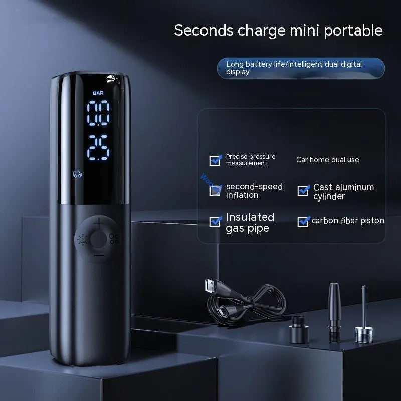 Black portable electric car air pump with tyre pressure gauge and inflation tube.