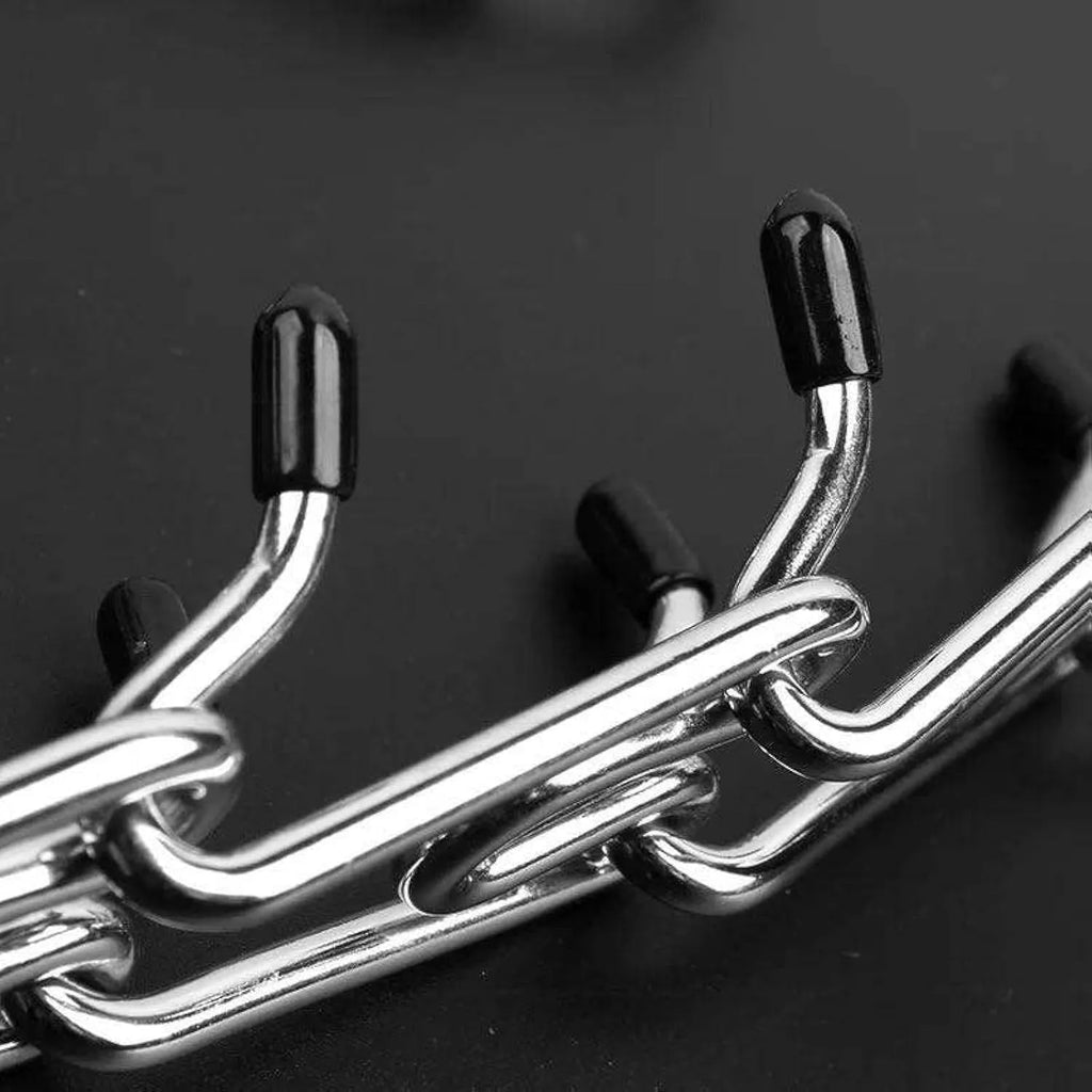Stainless steel dog training pinch collar with comfort rubber tips, shown adjusted to fit a medium-sized dog's neck.