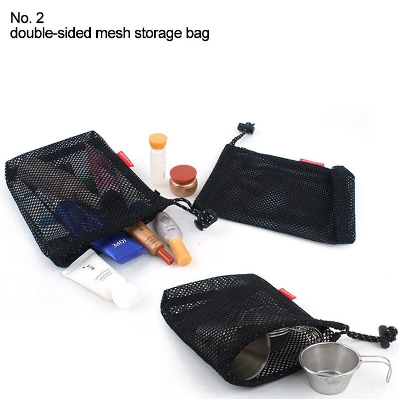 Red five-piece outdoor travel storage bag set with zipper closures on open bags showing internal pockets