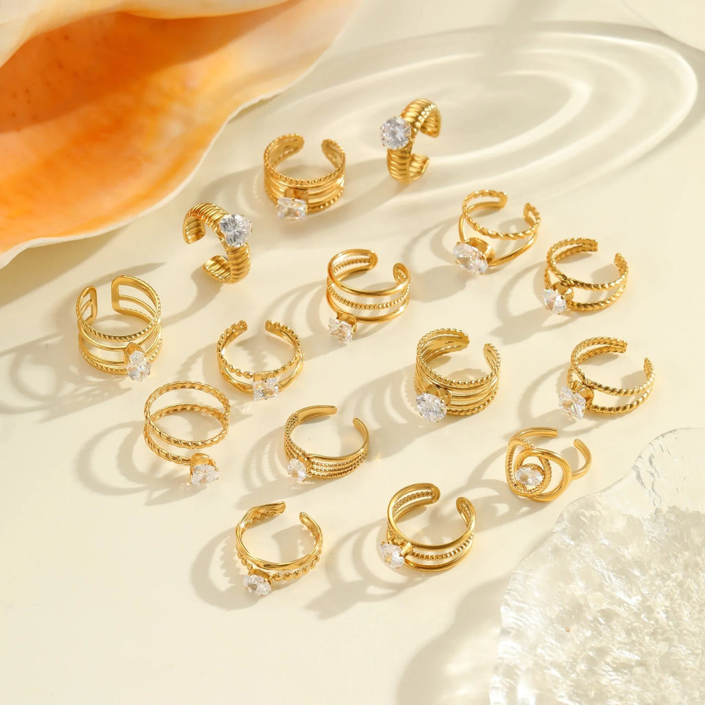 Open mouth stainless steel ring with gold plating and zircon geometric detailing