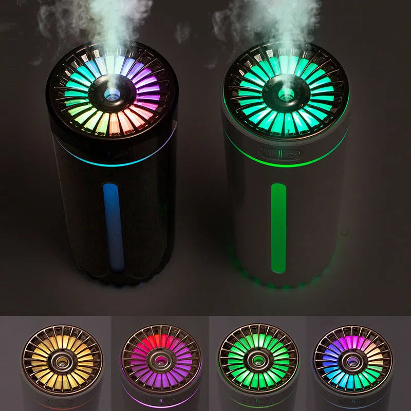 Black wireless USB humidifier with colourful lights on a car dashboard cup holder