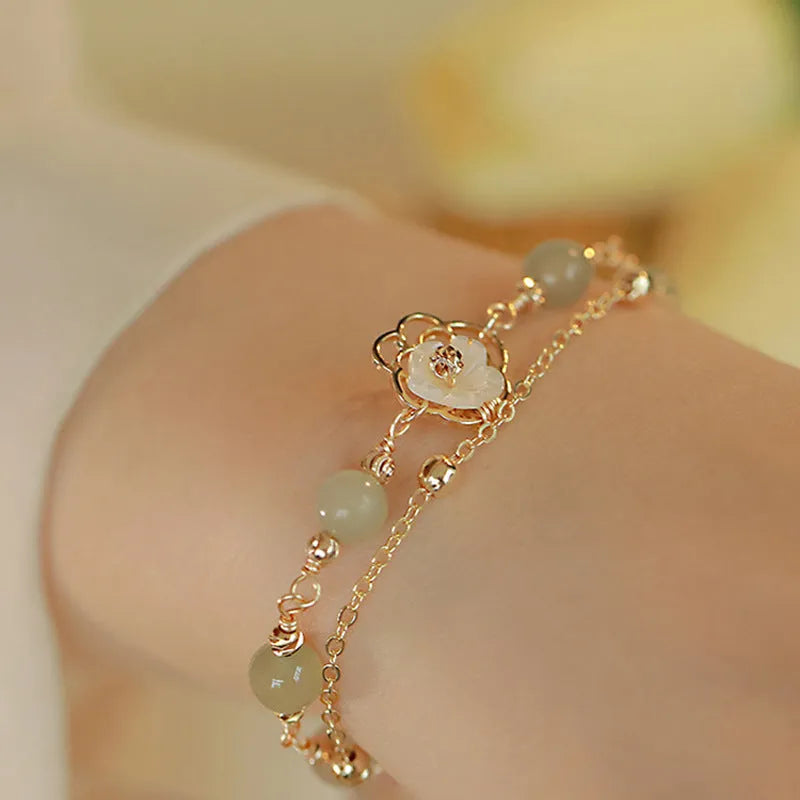 Yellow gold electroplated copper butterfly bracelet with geometric shape for women