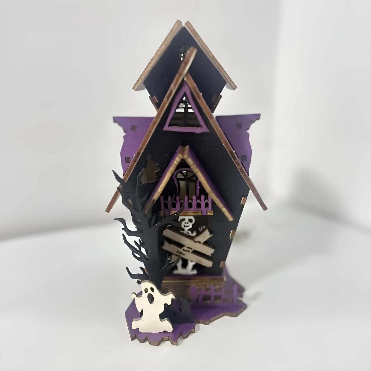 Wooden haunted house Halloween table decoration with luminous finish