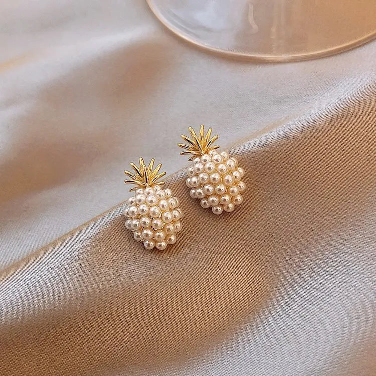 Korean style pineapple and starfish pearl design alloy earrings with electroplated gold, silver, pearl flower, and starfish pearl finishes.
