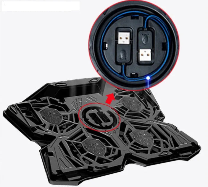 Blue laptop cooling base with four fans and USB ports on computer desk