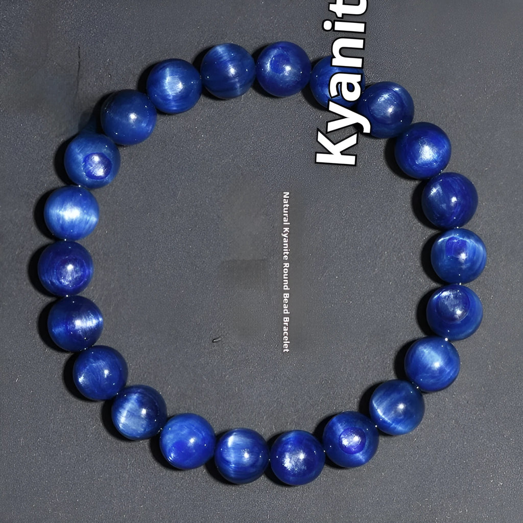 Natural blue crystal bead bracelet with geometric design and polished finish on a wrist.