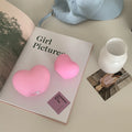 Vinyl atmosphere lamp in white and pink colours showing small and large size options