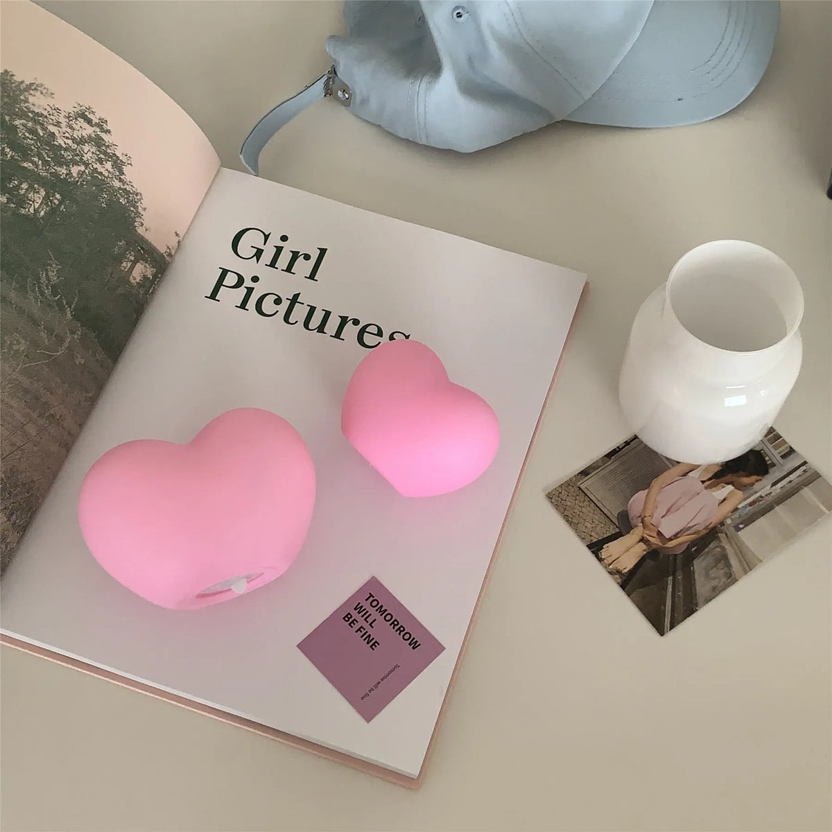 Vinyl atmosphere lamp in white and pink colours showing small and large size options