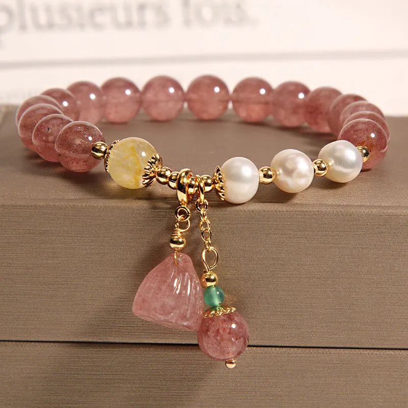 Women's multi-strand crystal bracelet with garnet, pearl, quartz, and jade pendants in Korean style design.