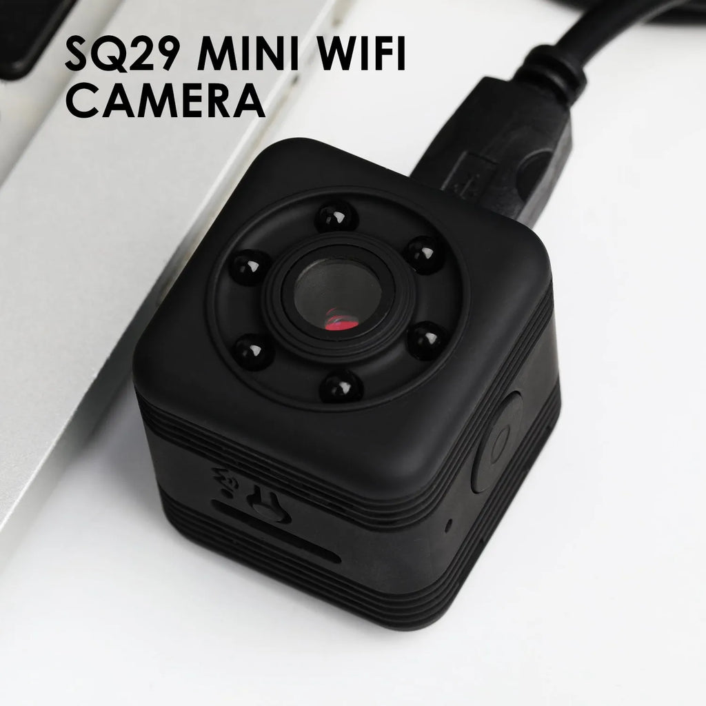 SQ29 black waterproof sports camera shown with MicroUSB port and support for 32GB memory cards.
