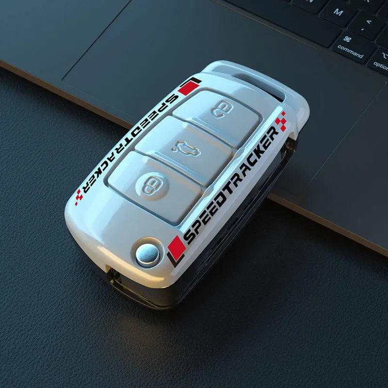 Carbon fibre pattern car key cover with mirrored surface elements in carbon black colour