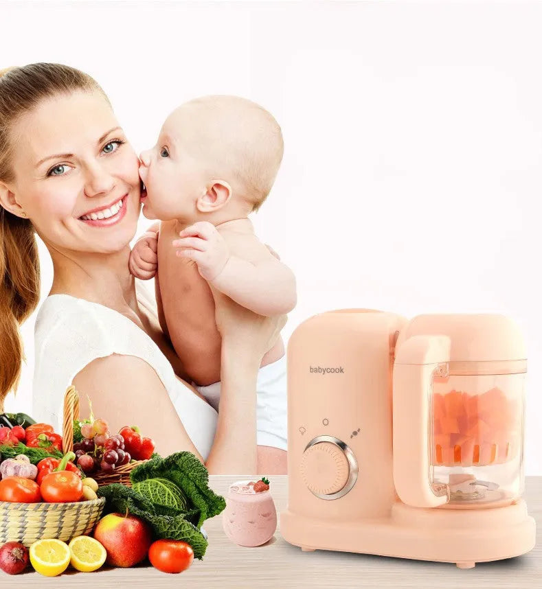 Green baby food processor with steamer and blender functions showing control panel and processing bowl