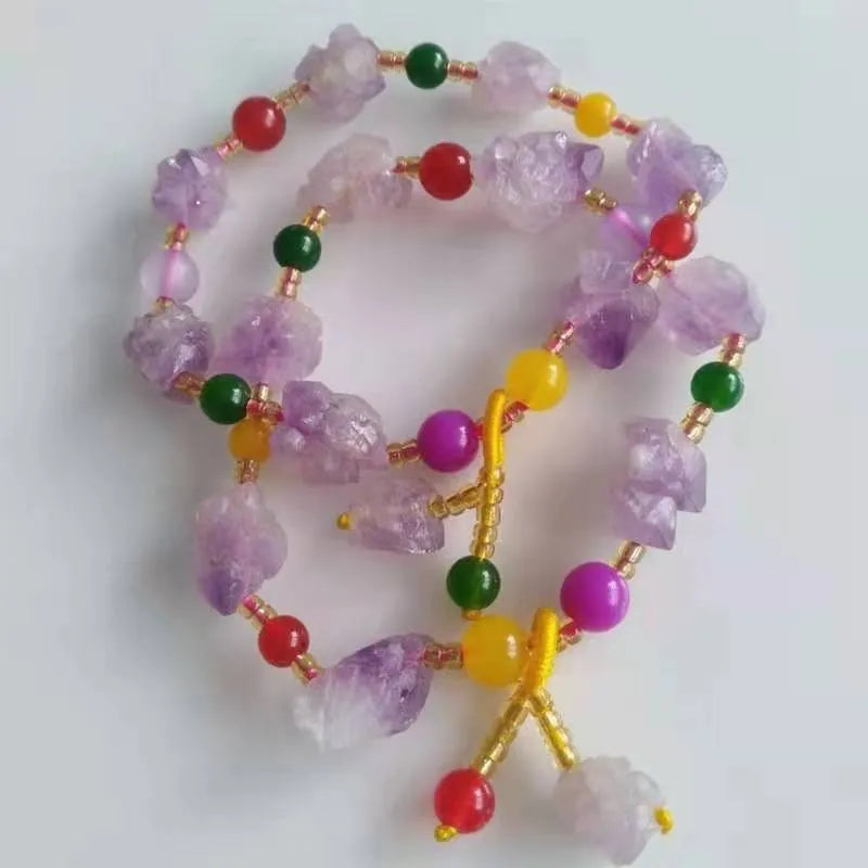 Purple amethyst bracelet with natural-shaped beads and fu character element detail