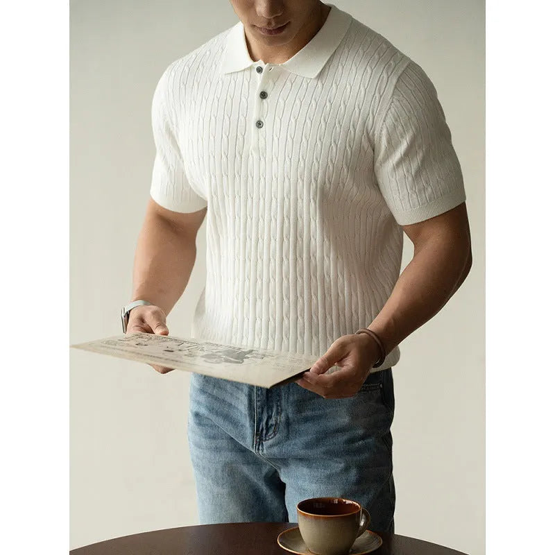 Men's khaki short sleeve business casual top laid flat, showing collar and sleeve detail.