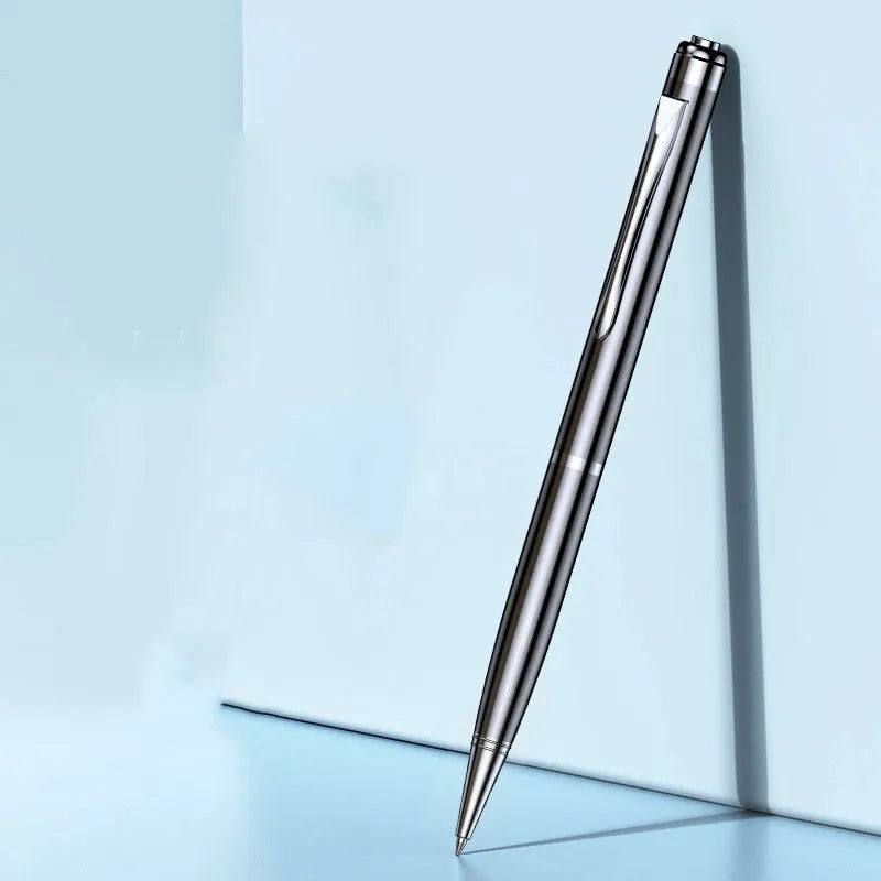Black pen-shaped audio recorder with zinc alloy body shown next to included headset and data cable.