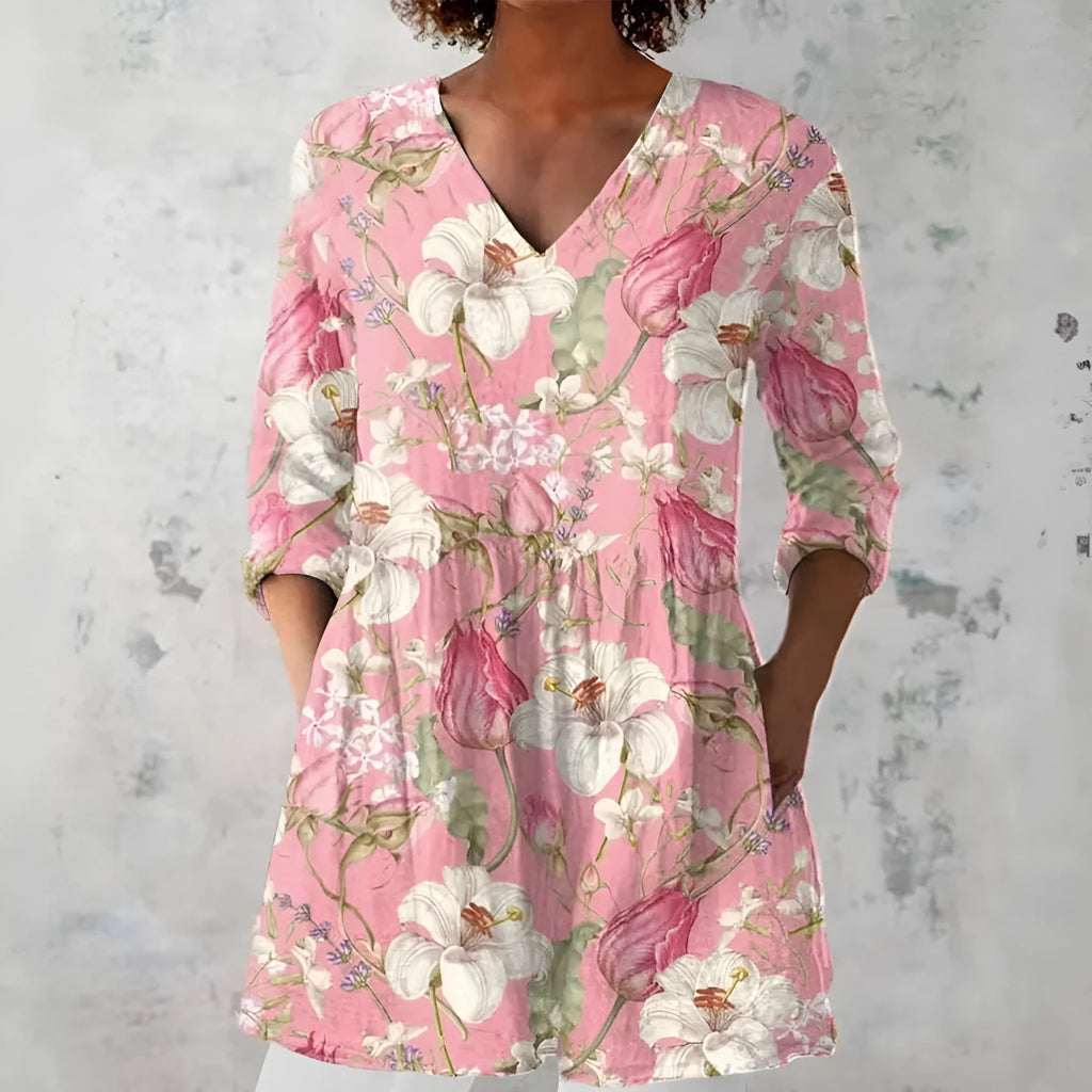 Women's slim fit long-sleeved top with retro digital print design in a colour selection.