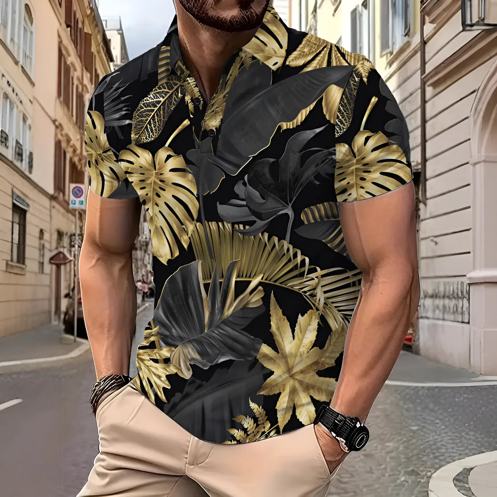 Men's gold short sleeve shirt with a tropical leaf pattern print.