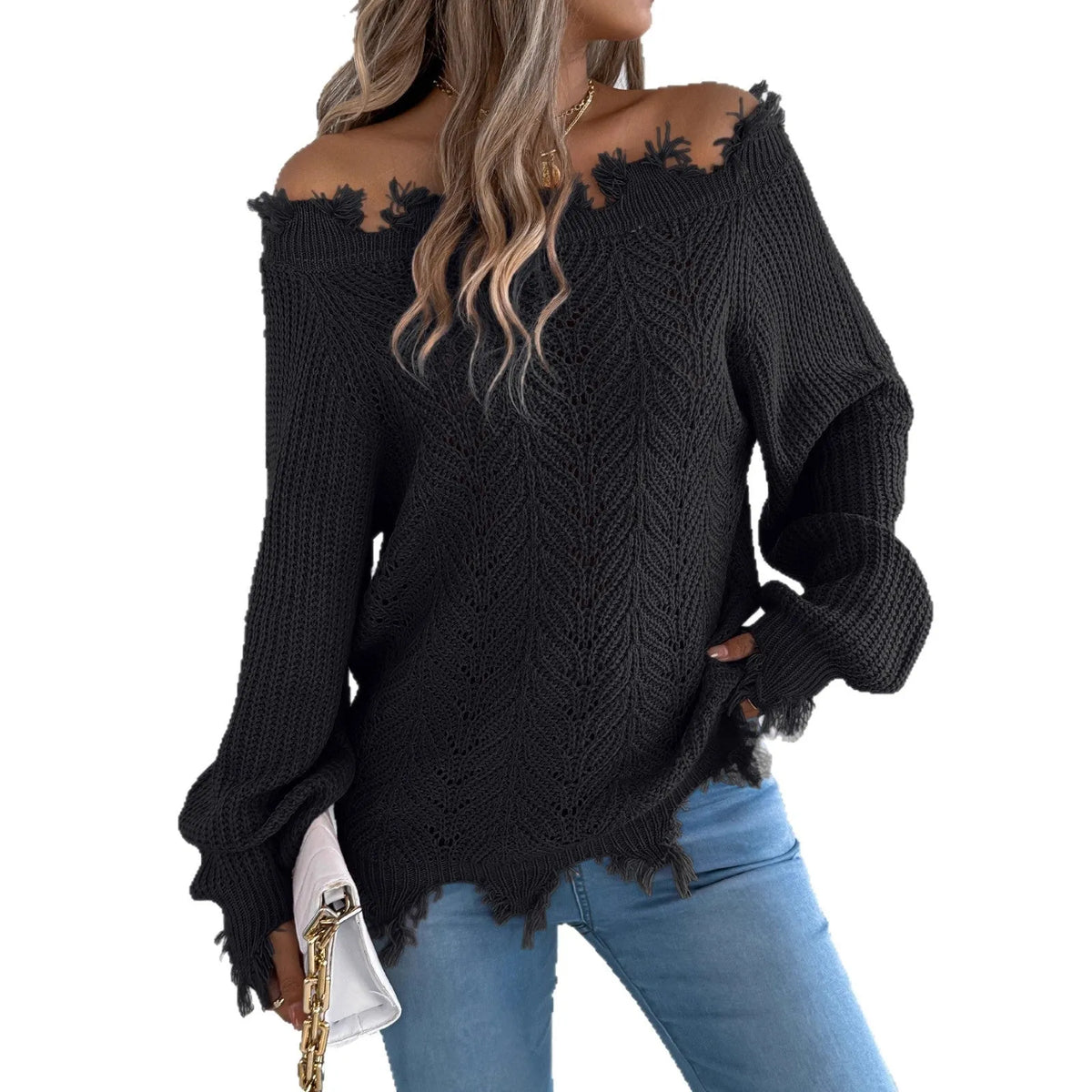 White hollow-out cut off-the-shoulder long sleeve pullover sweater on a hanger showing acrylic knit fabric detail.