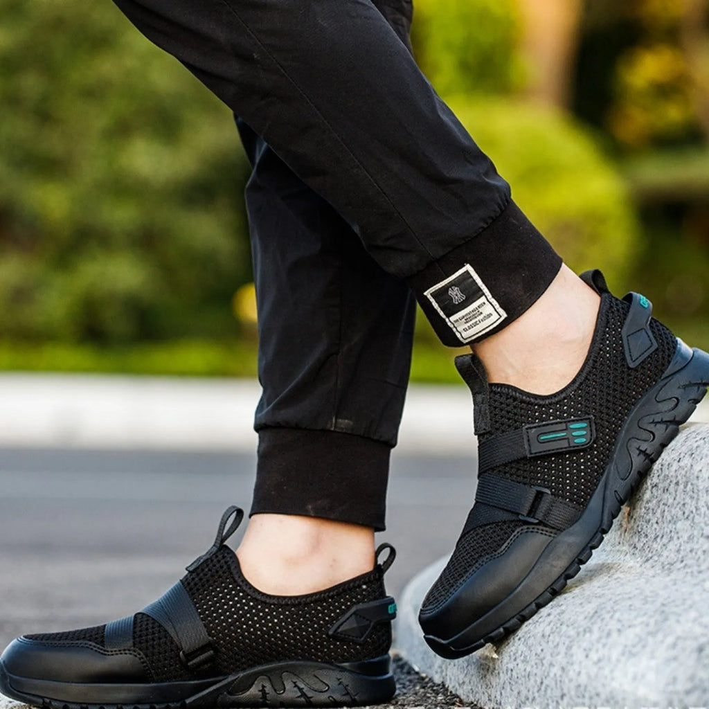 Men's anti-smash anti-puncture work insulation safety shoes with flying woven upper and rubber sole