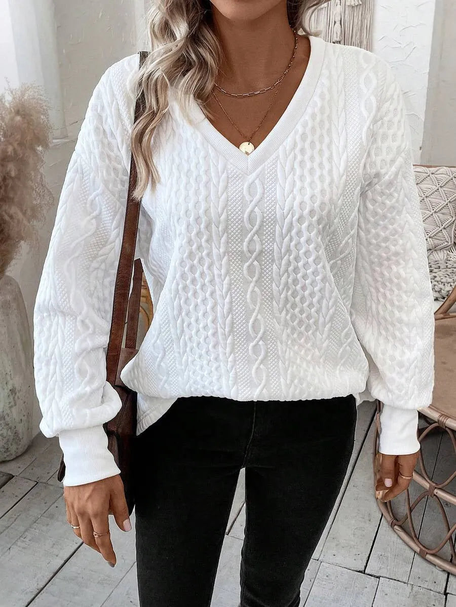 Milky white loose fit long sleeve T-shirt with a 3D pattern detail on the front