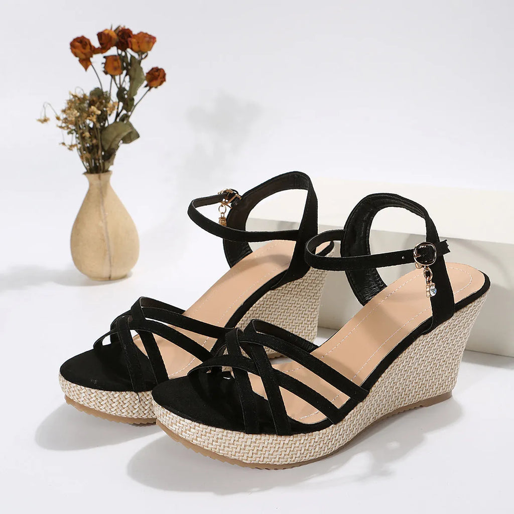 Women's wedge sandals with fish mouth toe opening and cloth upper in black colour