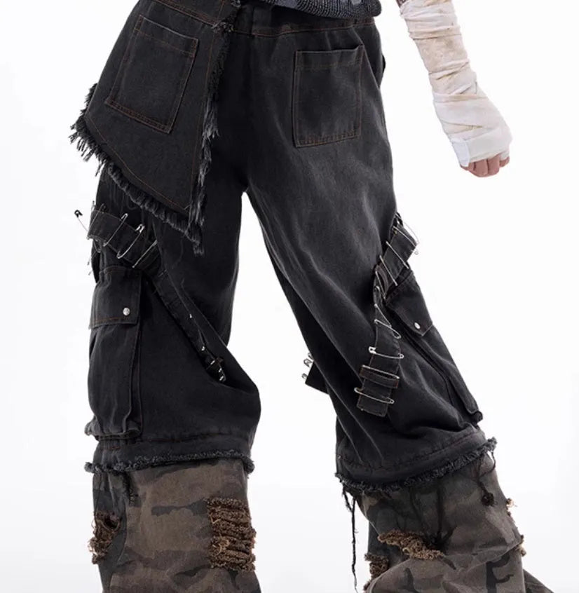 Men's grey cotton denim jeans with camouflage splicing pattern and structural pin and ribbon decorative details