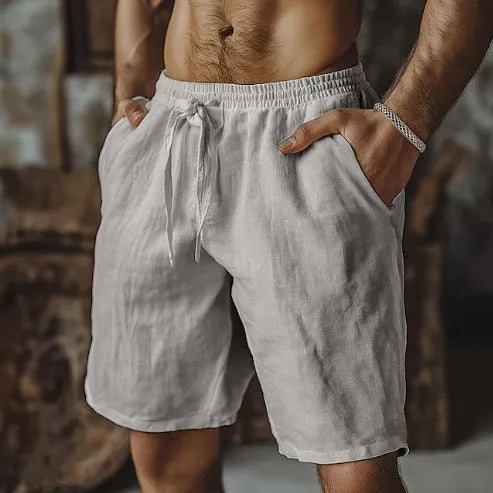 Men's solid colour cotton-linen straight-leg casual shorts on a hanger.