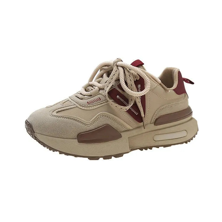 Women's black retro platform sports shoes with round toe and lace-up fastening on a rubber sole.