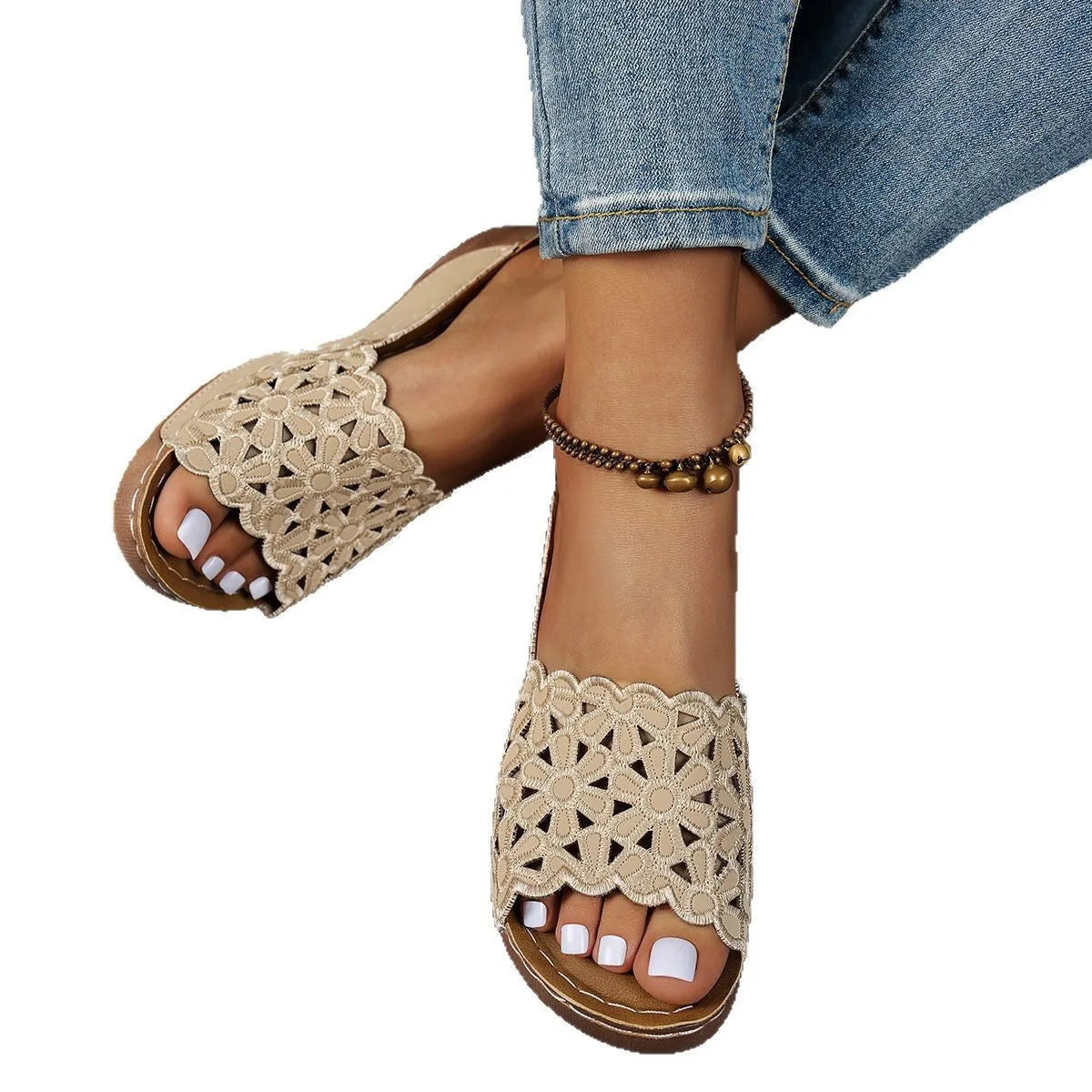 Women's black wedge beach slippers with floral cutouts and an open fish mouth toe design.