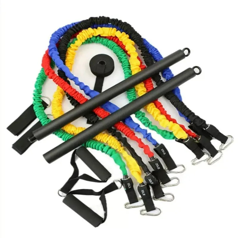 Two-segment push-and-pull fitness stick with attached rope next to its carrying bag.