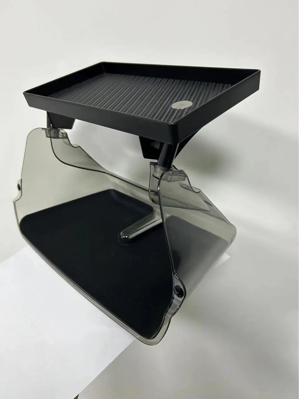 Black ABS plastic storage box for under the Tesla Model 3 and Y centre console screen.