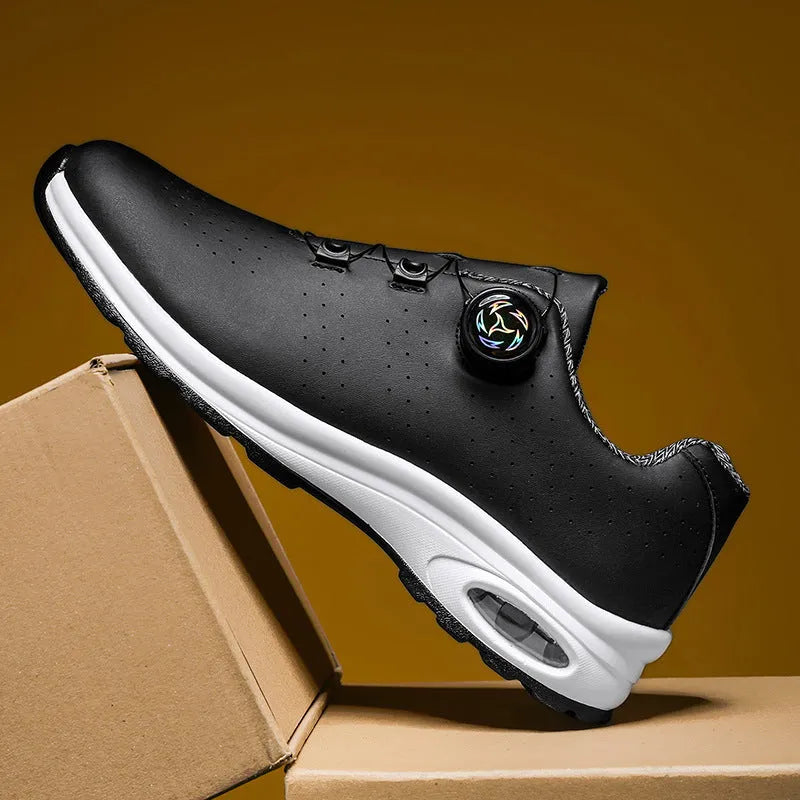 Men's black low-top casual shoes with mesh upper and white laces on a flat composite sole.