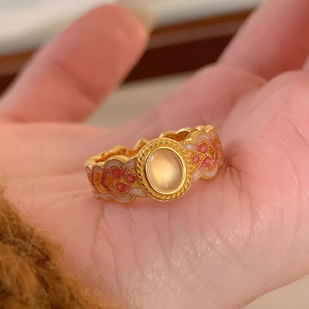 Pink crystal enamel geometric open mouth ring for women with gold plating.