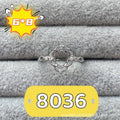 Oval denier ring with 6x8mm stone and five-pointed star element on copper band